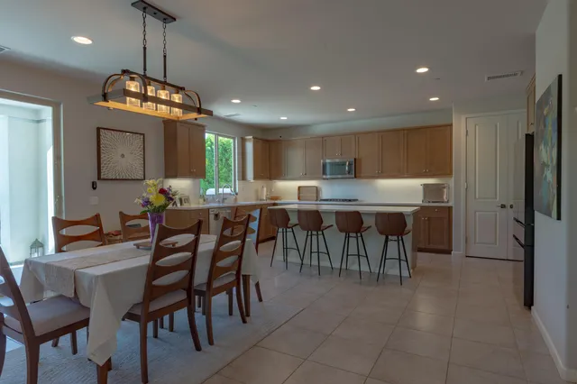 a large white refrigerator freezer sitting in a kitchen