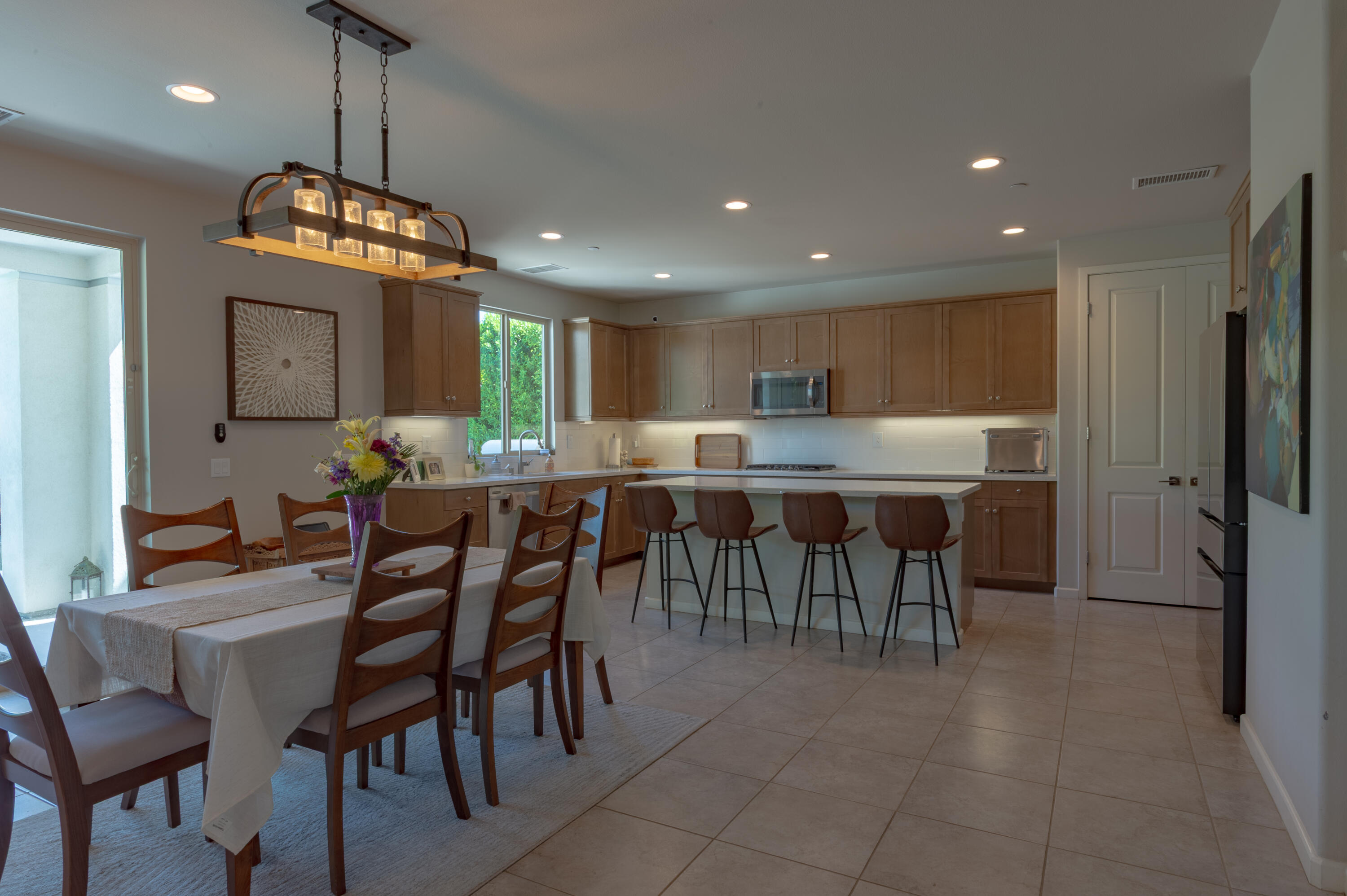 74500 Xander Court Palm Desert, CA 92211 - Photo 15 of 36 a view of a dining room with furniture