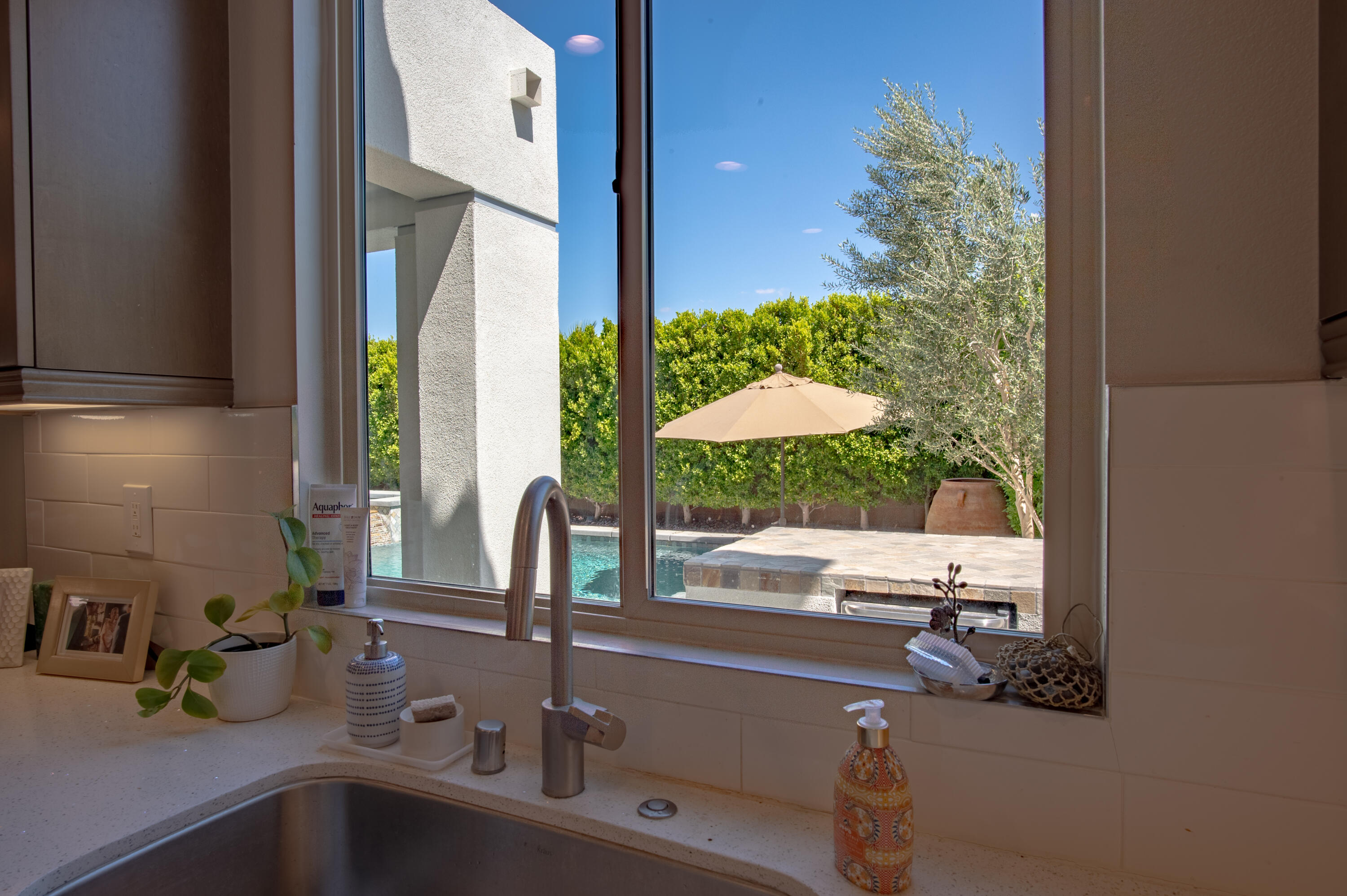 74500 Xander Court Palm Desert, CA 92211 - Photo 19 of 36 a bathroom with a sink and a mirror