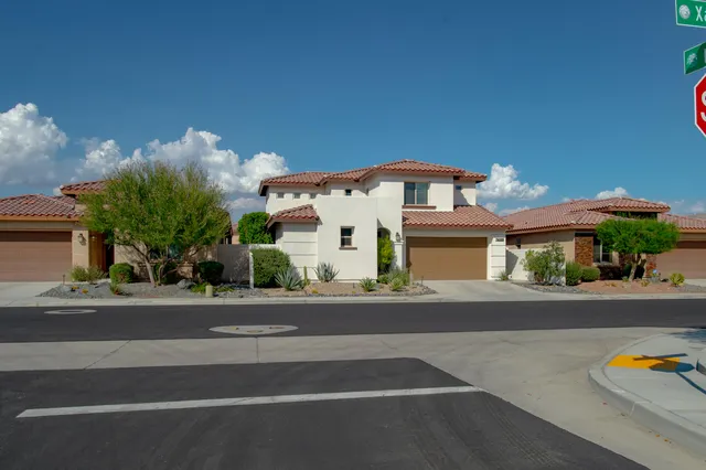 front view of a house with a street