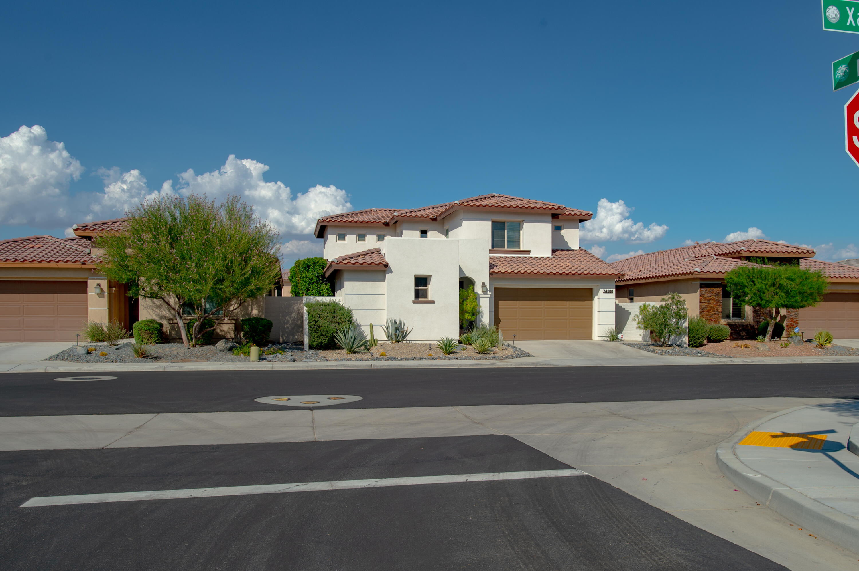 74500 Xander Court Palm Desert, CA 92211 - Photo 2 of 36 front view of a house with a street