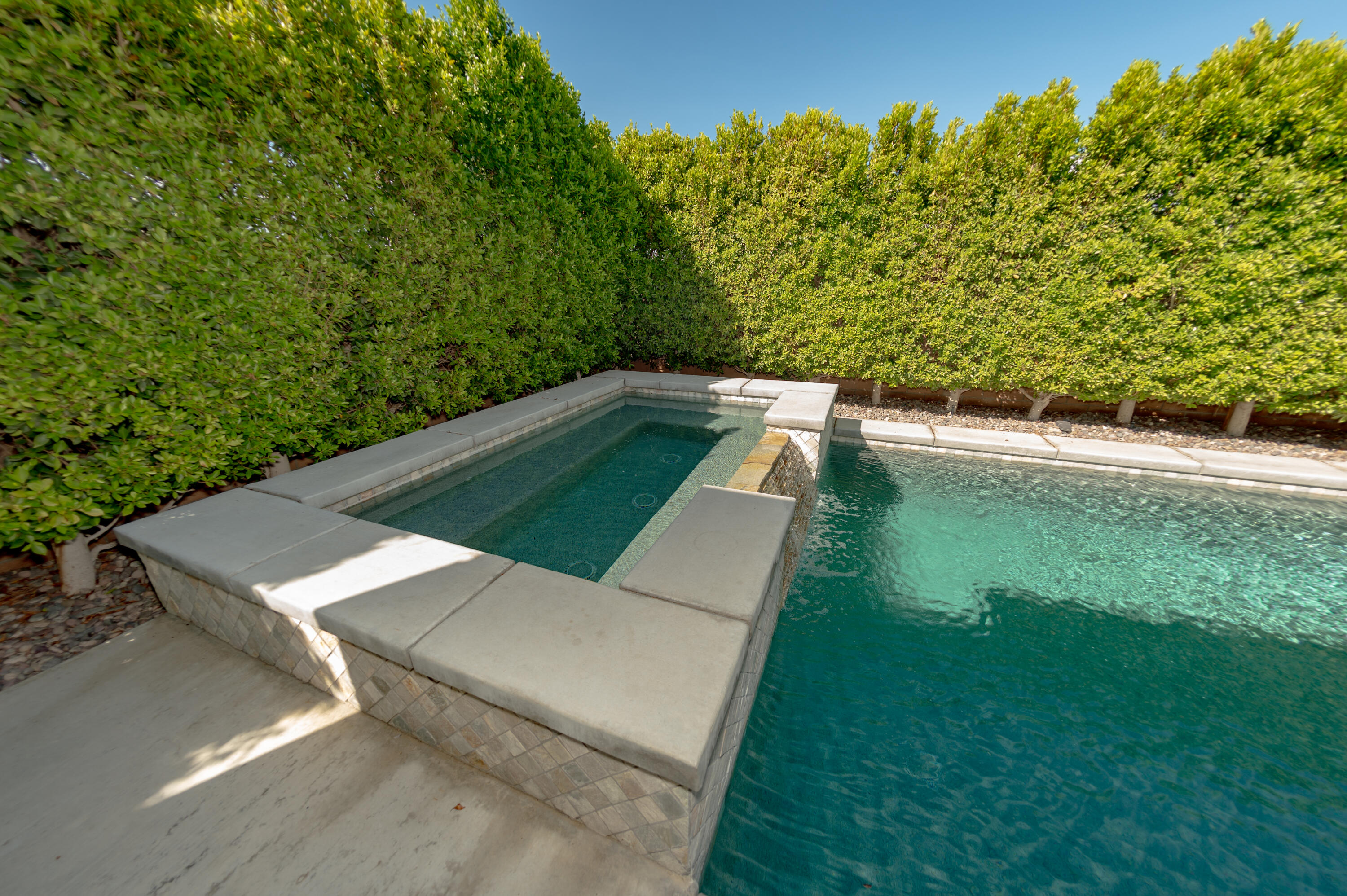 74500 Xander Court Palm Desert, CA 92211 - Photo 21 of 36 a view of a backyard with sitting area