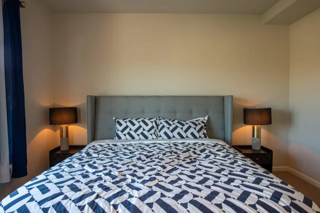 a room with furniture and a mirror