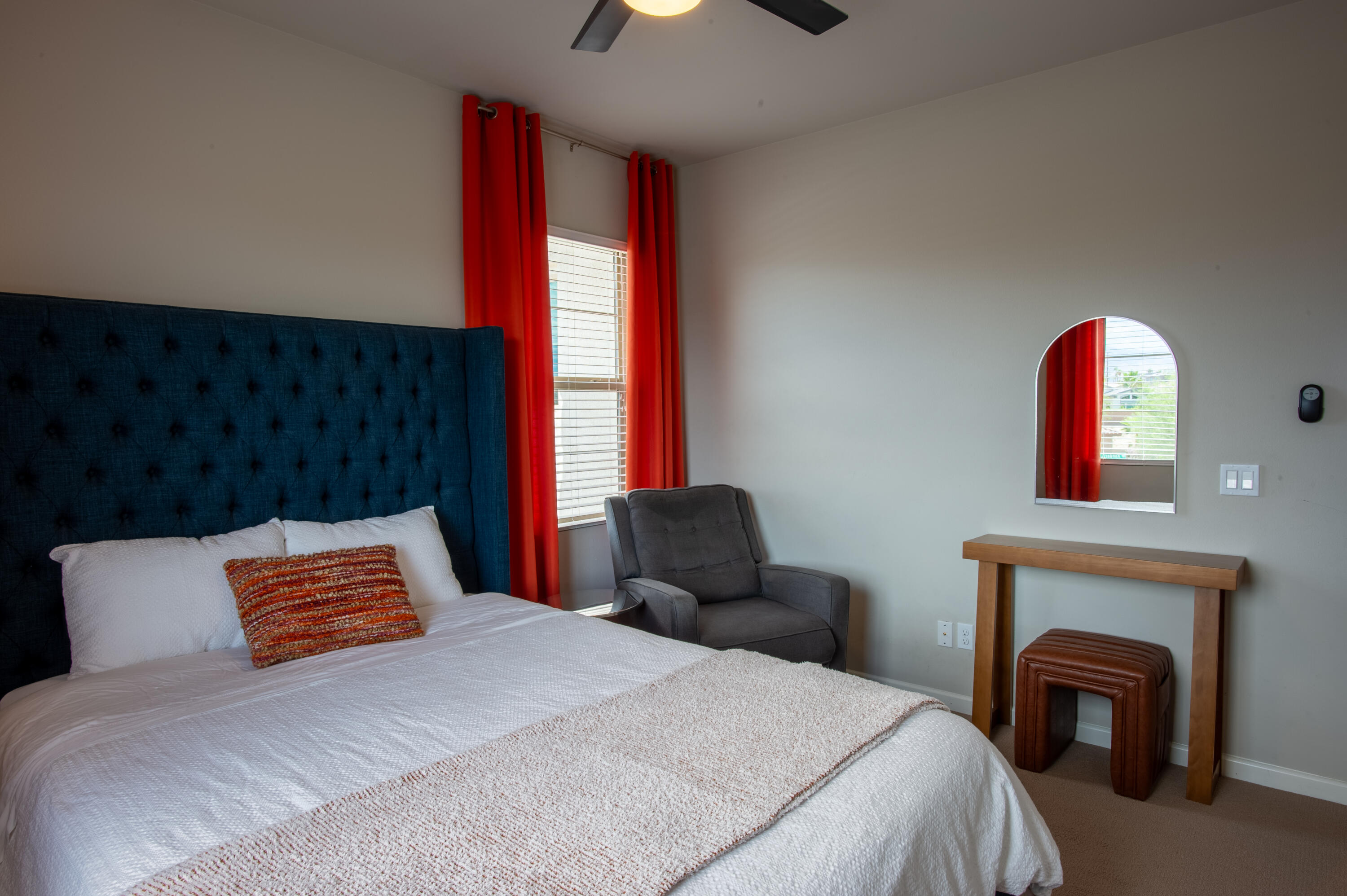 74500 Xander Court Palm Desert, CA 92211 - Photo 32 of 36 a bedroom with a bed and a fireplace