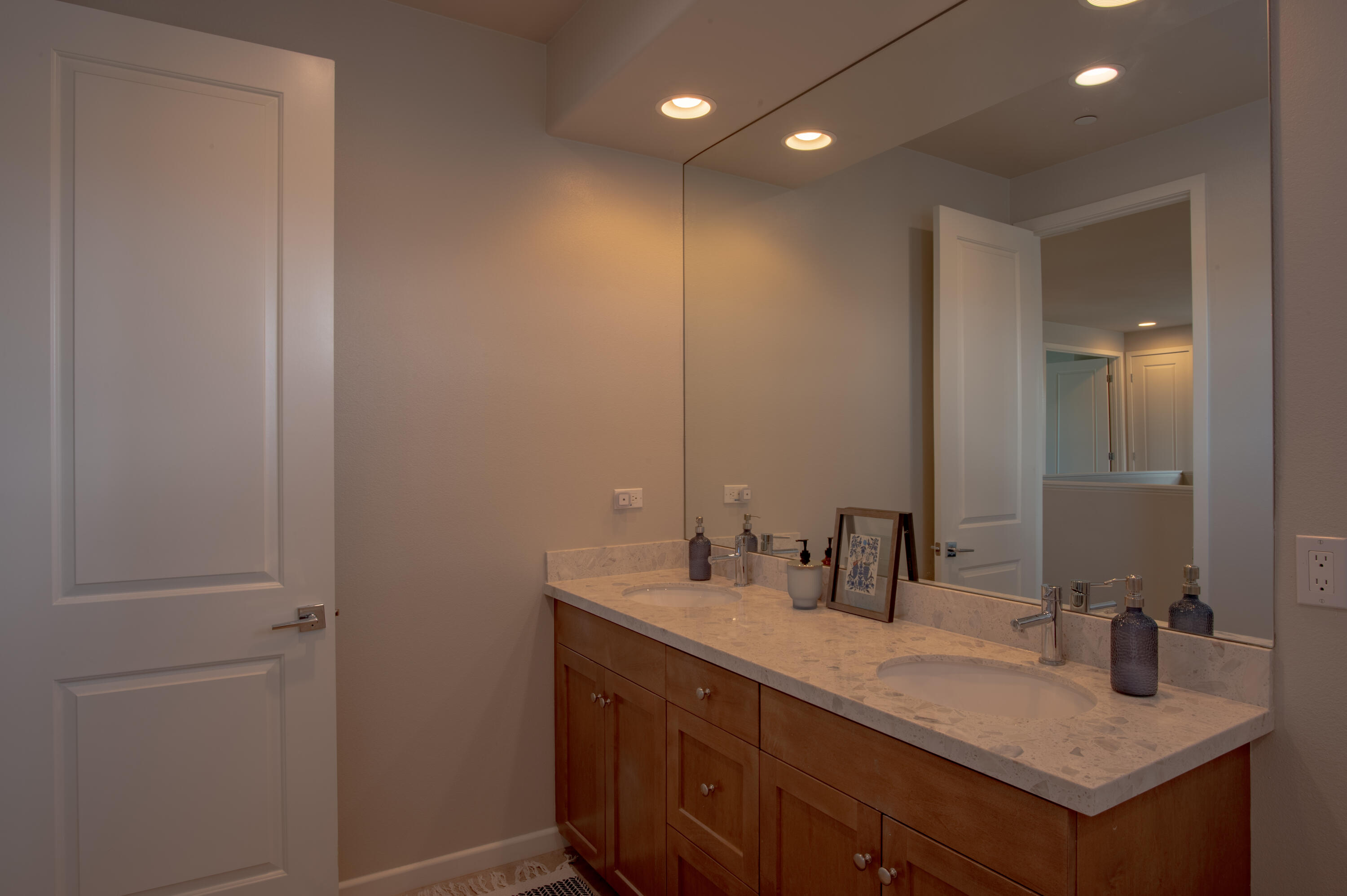 74500 Xander Court Palm Desert, CA 92211 - Photo 33 of 36 a bathroom with a sink and a mirror