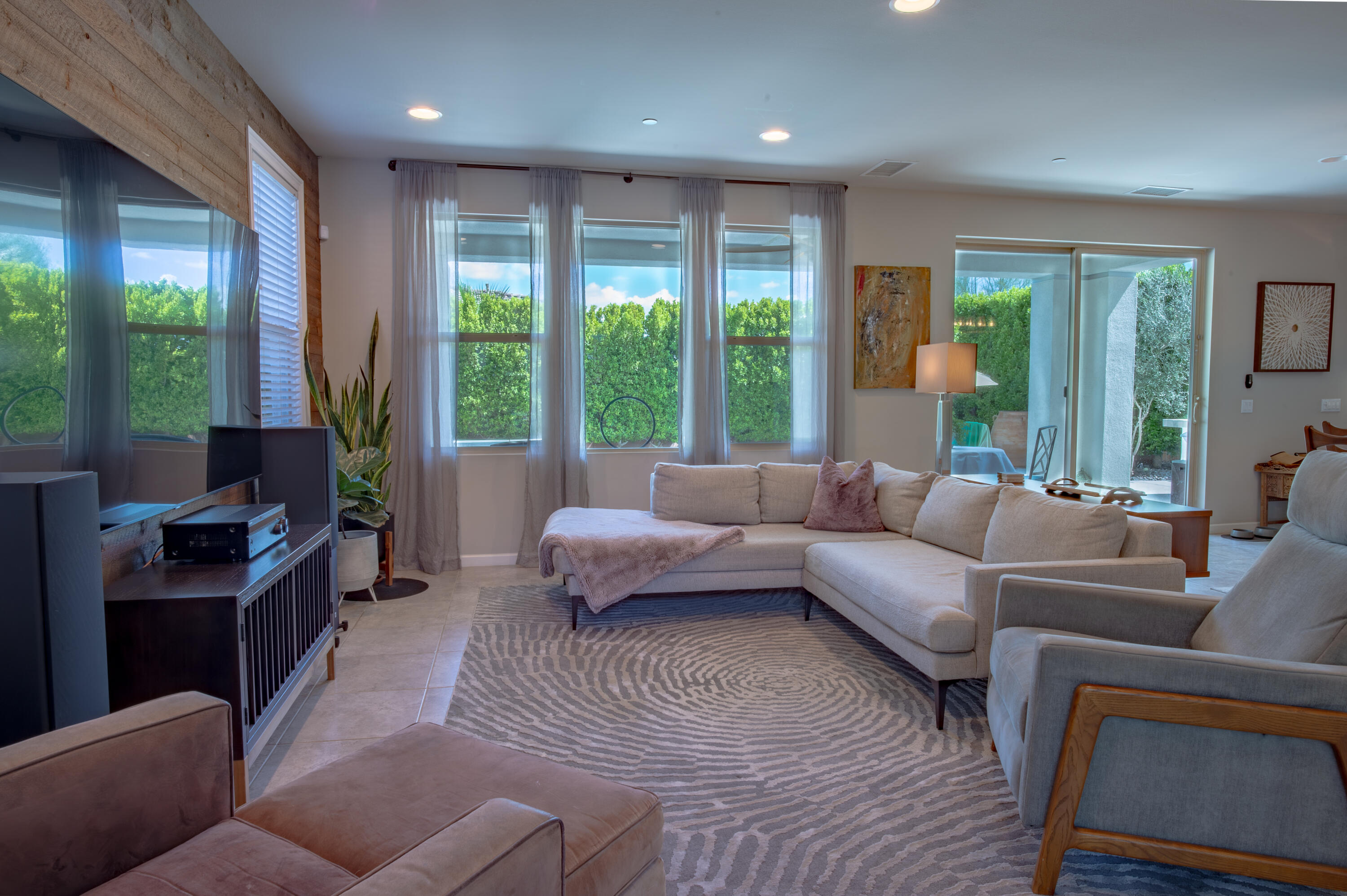 74500 Xander Court Palm Desert, CA 92211 - Photo 10 of 36 a living room with furniture and a large window