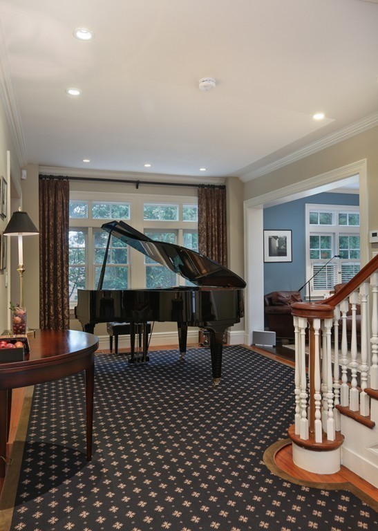 61 Clark Road Brookline, MA 02445 - Photo 5 of 14 a living room with furniture a rug and a table