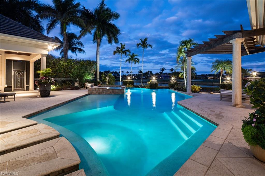 2145 Canna Way Naples, FL 34105 - Photo 3 of 49 a view of a backyard with swimming pool