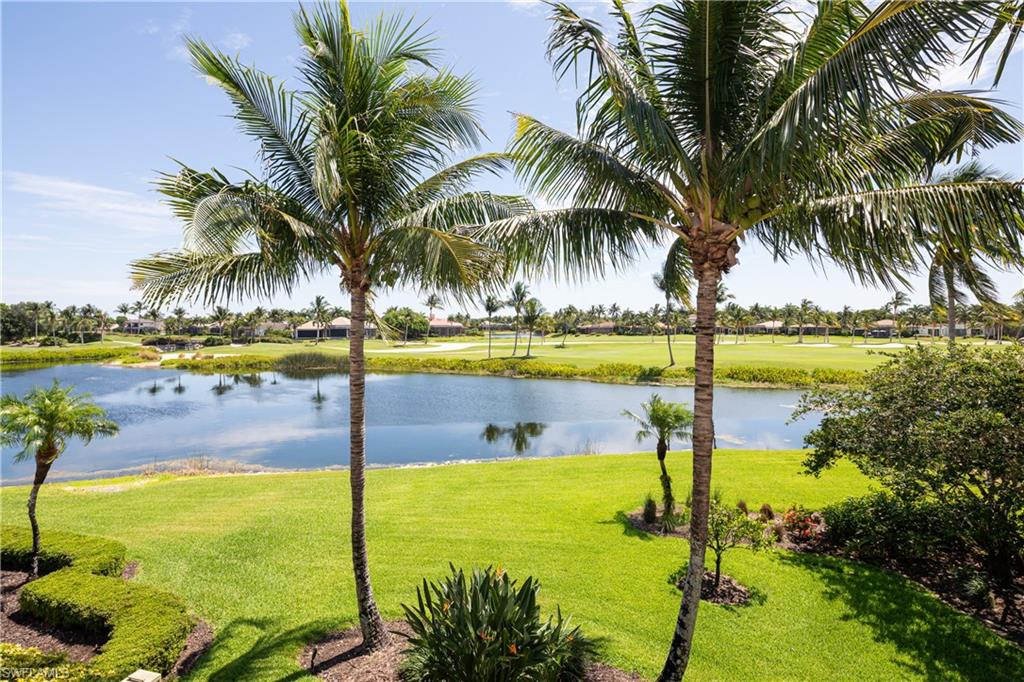 2145 Canna Way Naples, FL 34105 - Photo 41 of 49 a view of a swimming pool and an outdoor space