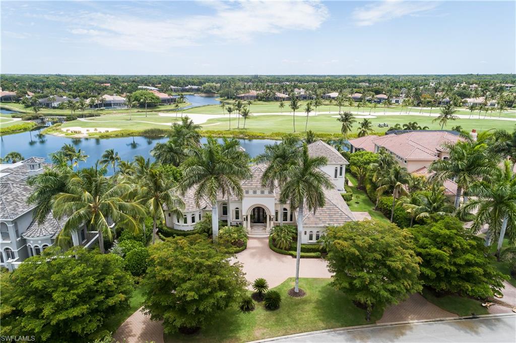 2145 Canna Way Naples, FL 34105 - Photo 44 of 49 an aerial view of residential houses with outdoor space and swimming pool
