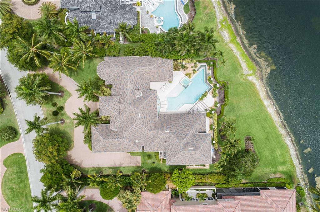 2145 Canna Way Naples, FL 34105 - Photo 45 of 49 an aerial view of a house with a garden