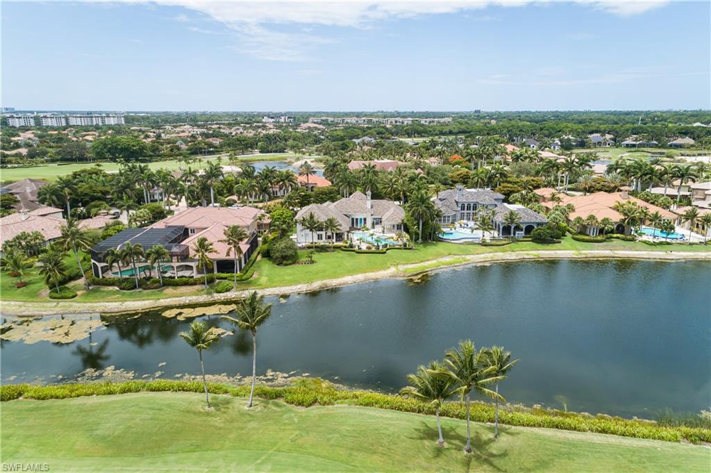 2145 Canna Way Naples, FL 34105 - Photo 47 of 49 an aerial view of residential houses with outdoor space and lake view