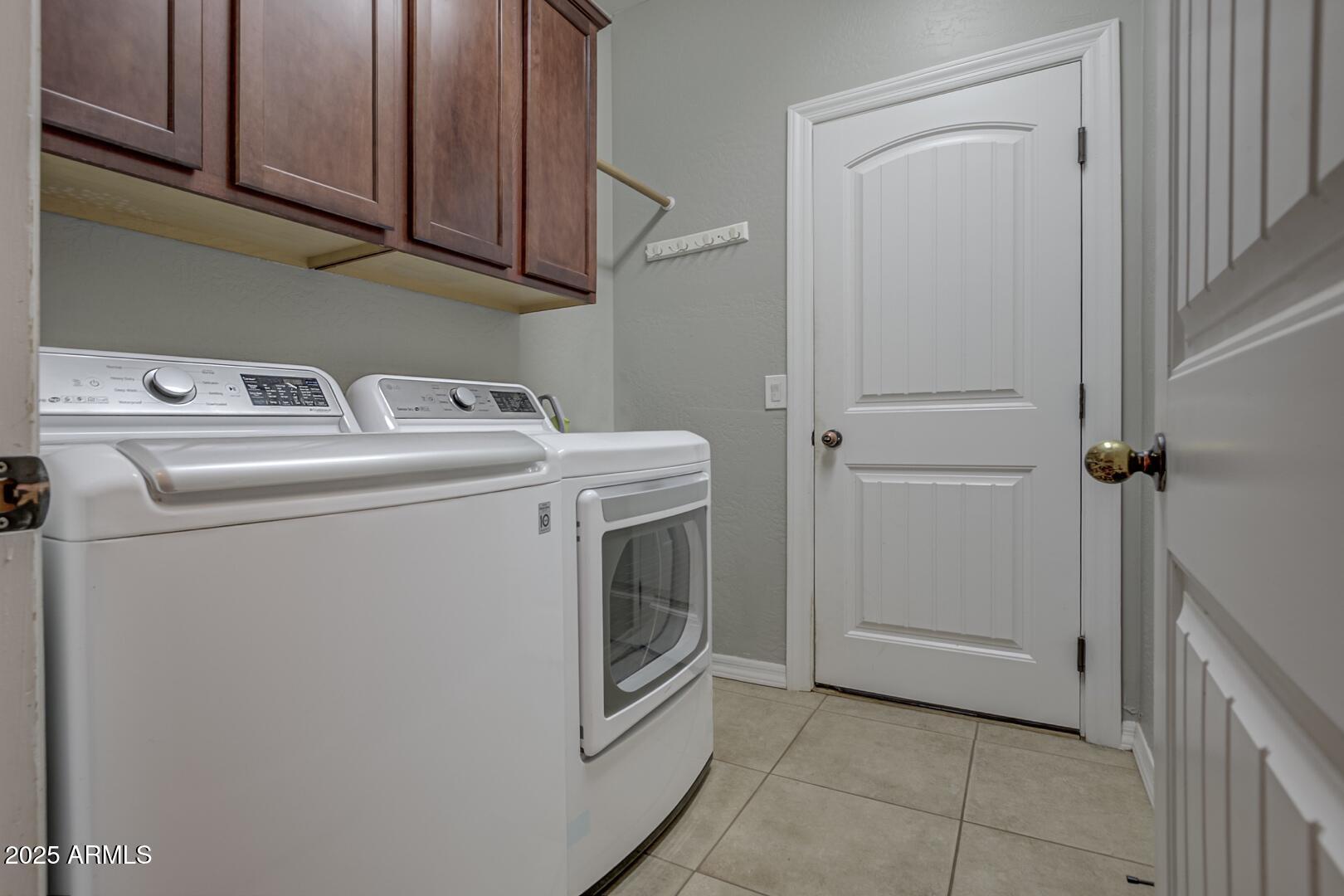 406 Granite Butte Road Star Valley, AZ 85541 - Photo 22 of 24 a utility room with dryer and washer