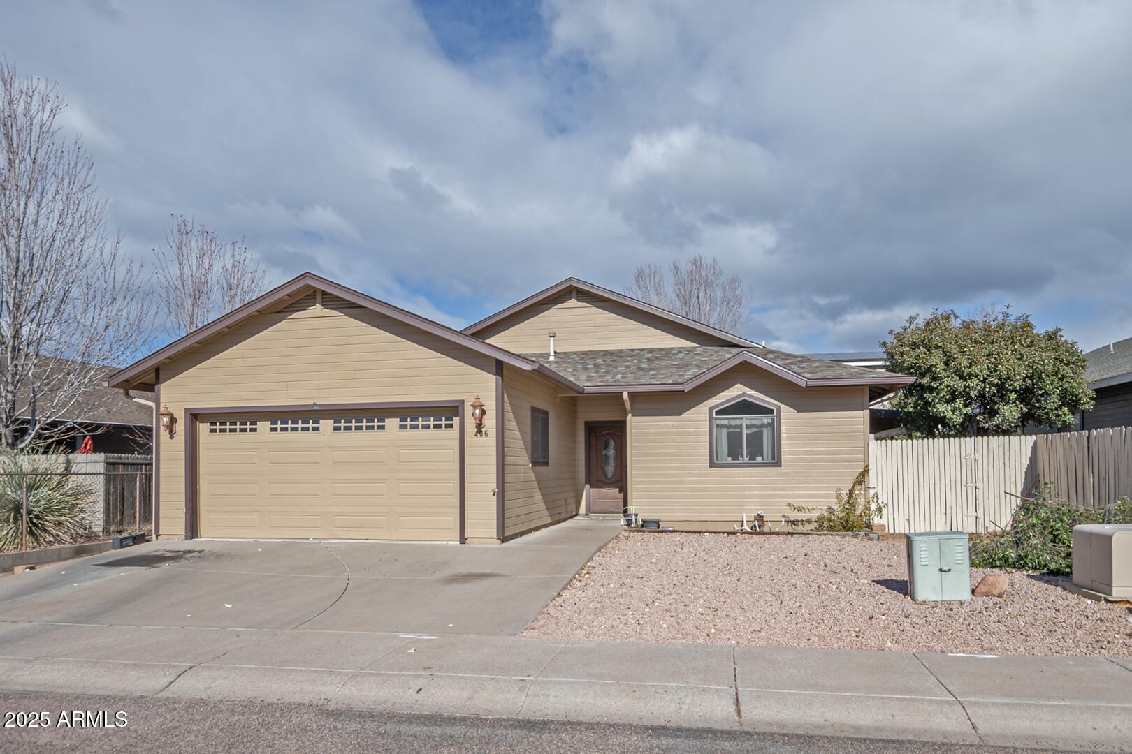 406 Granite Butte Road Star Valley, AZ 85541 - Photo 24 of 24 a view of a house with a yard and garage