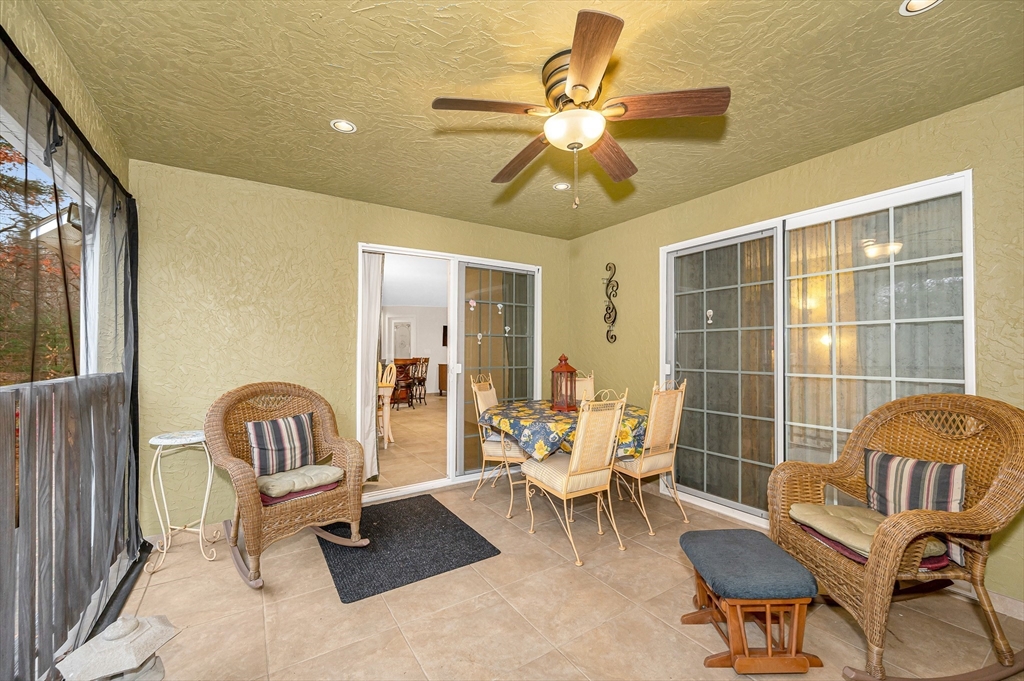 454 Dunstable Road Tyngsborough, MA 01879 - Photo 12 of 41 a living room with furniture and a window