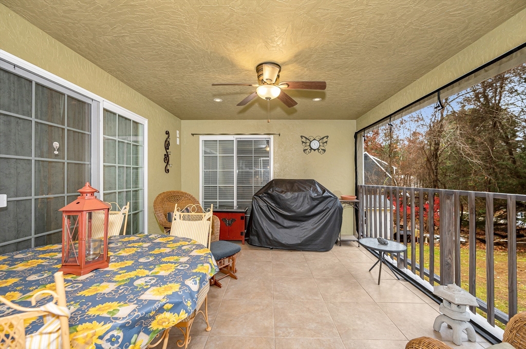 454 Dunstable Road Tyngsborough, MA 01879 - Photo 13 of 41 a view of a dining room with furniture window and outside view