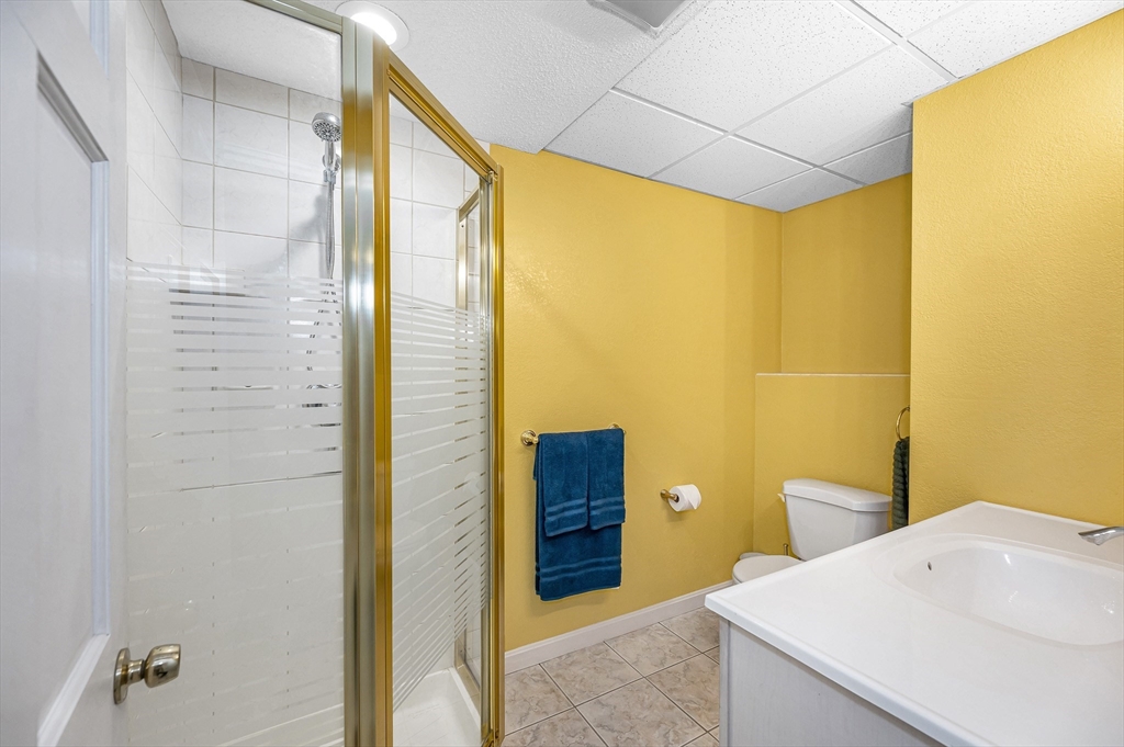 454 Dunstable Road Tyngsborough, MA 01879 - Photo 28 of 41 a bathroom with a sink and a shower