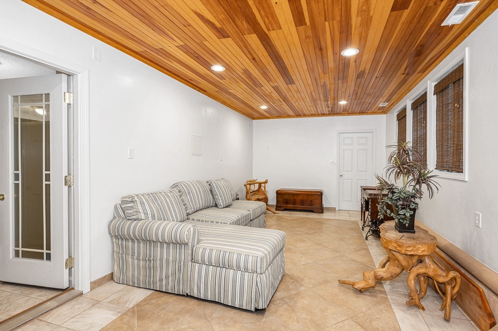 454 Dunstable Road Tyngsborough, MA 01879 - Photo 32 of 41 a living room with furniture