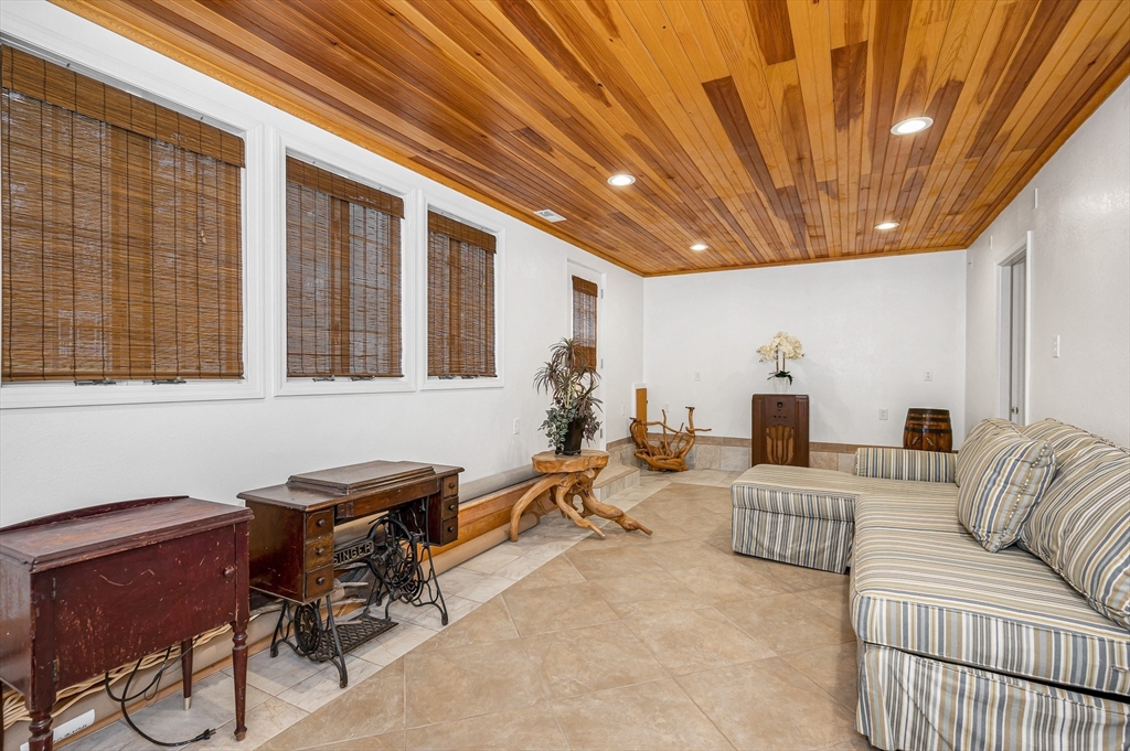 454 Dunstable Road Tyngsborough, MA 01879 - Photo 33 of 41 a living room with furniture