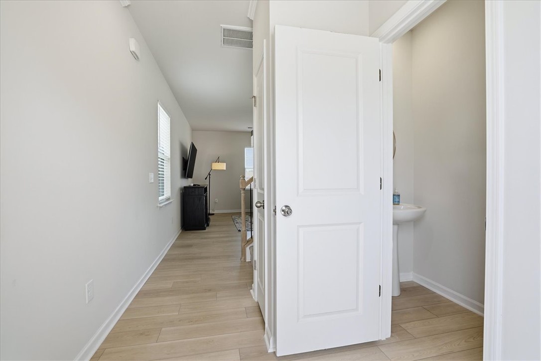 365 Sliding Rock Drive Pendleton, SC 29670 - Photo 6 of 46 Clean lines and a luminous hallway create an inviting transition to the living space.