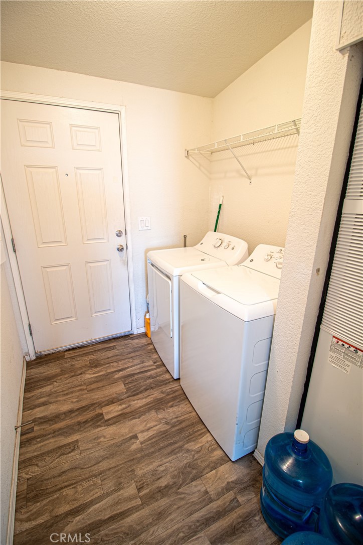 4444 East Ave R, Unit 202 Palmdale, CA 93552 - Photo 23 of 23 a utility room with a washer and dryer