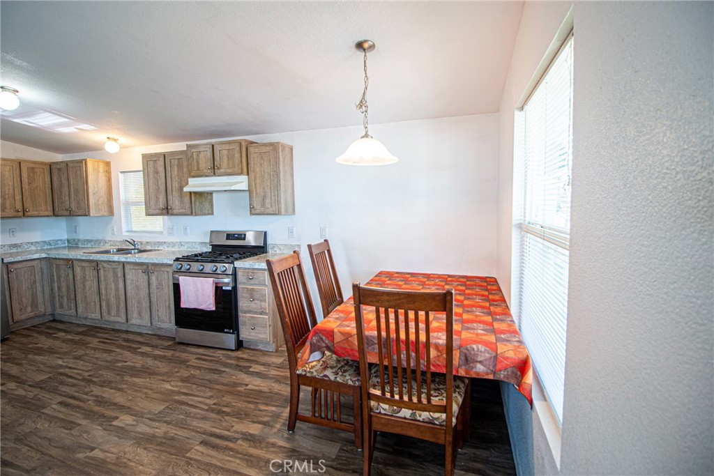 4444 East Ave R, Unit 202 Palmdale, CA 93552 - Photo 8 of 23 a outdoor dining room with furniture and window
