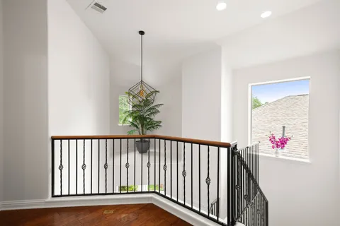 a view of a porch and potted plants