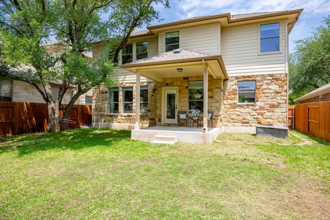 a view of a house with a patio