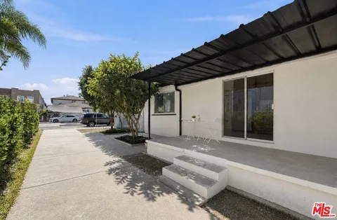 a view of a house with a patio