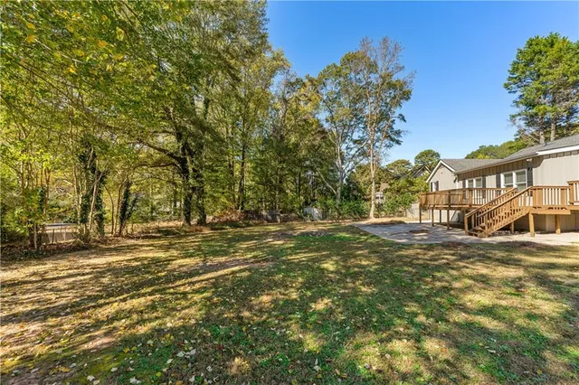 a view of a street with a building in the background