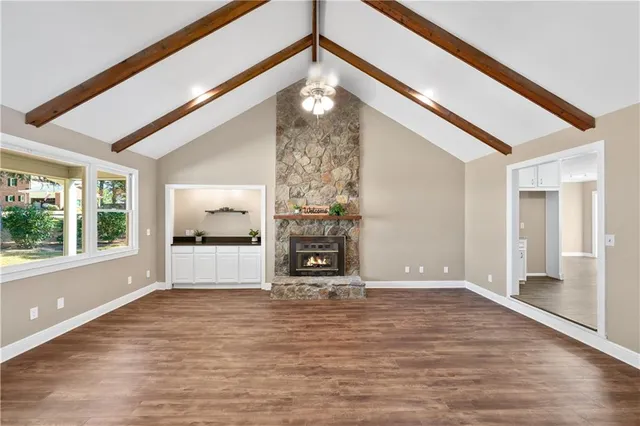 a view of a livingroom with wooden floor