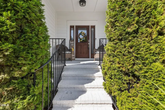 a front view of a house with a porch