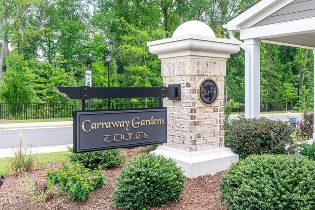 a view of a swimming pool with sitting area