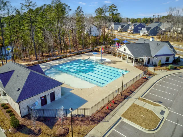 a view of house with outdoor space and sitting area
