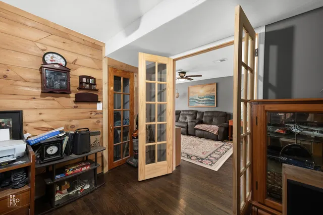 a view of living room with furniture and flat screen tv