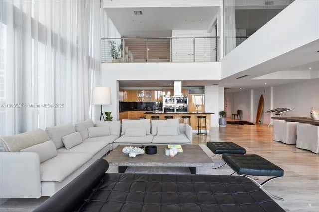 a living room with furniture and a table