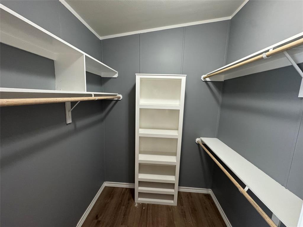 131 Lipan Trail Weatherford, TX 76087 - Photo 16 of 25 a view of an empty walk in closet