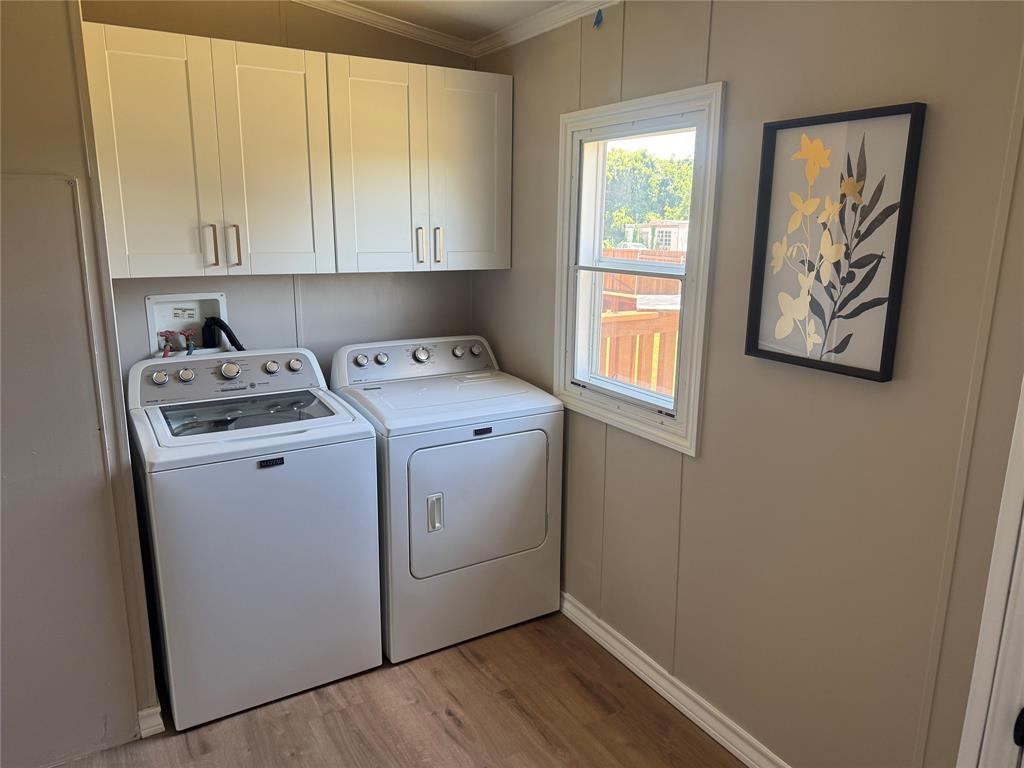 131 Lipan Trail Weatherford, TX 76087 - Photo 24 of 25 a utility room with dryer and washer