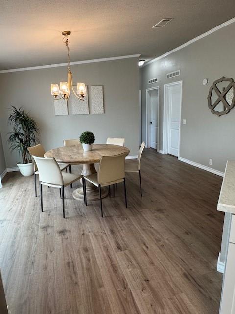 131 Lipan Trail Weatherford, TX 76087 - Photo 8 of 25 a view of a dining room with furniture and wooden floor