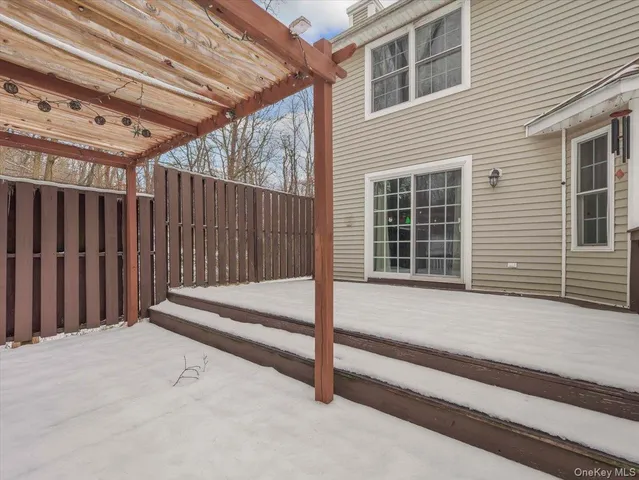 a view of backyard with deck