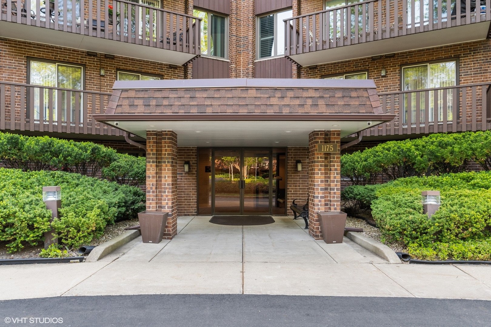 1175 Lake Cook Road, Unit 204 Northbrook, IL 60062 - Photo 18 of 20 a view of a building with a window and potted plants