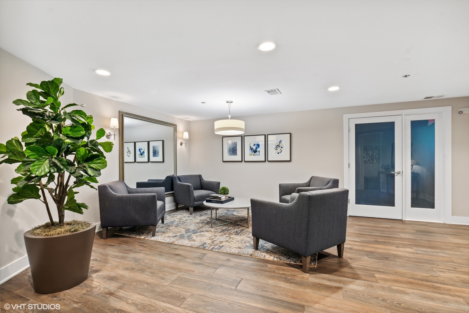 1175 Lake Cook Road, Unit 204 Northbrook, IL 60062 - Photo 19 of 20 a living room with furniture and a potted plant