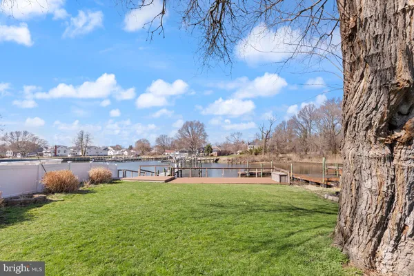 a view of a deck with a yard