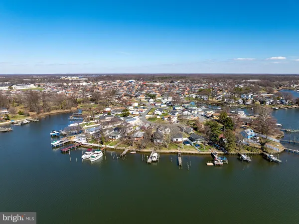 an aerial view of a house with swimming pool
