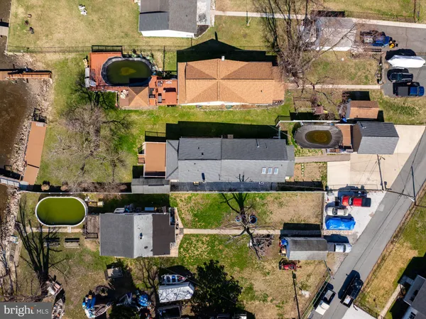 an aerial view of a house with a ocean view