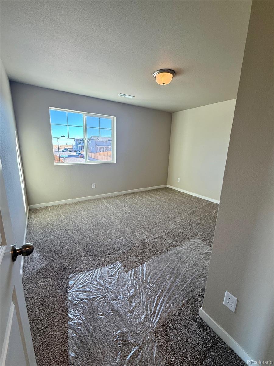 757 North Clubview Street Watkins, CO 80137 - Photo 19 of 24 a view of a room