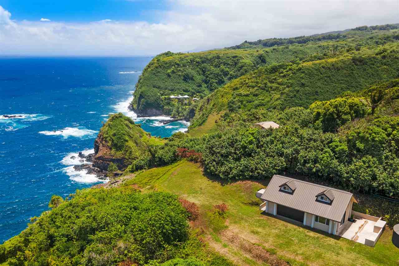 664 Huelo Road, Unit #B Haiku, HI 96708 - Photo 2 of 28 an aerial view of a house with a yard