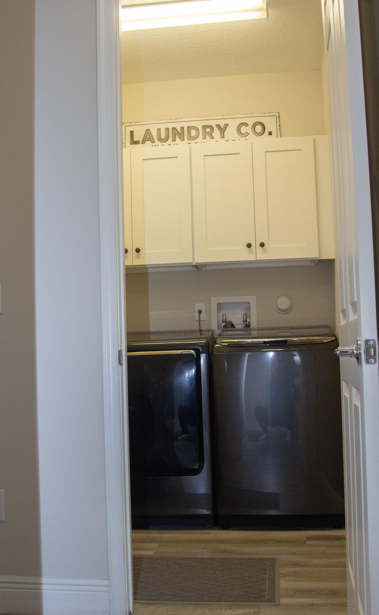 12601 57th Road North West Palm Beach, FL 33411 - Photo 19 of 24 a view of kitchen with a sink and cabinets