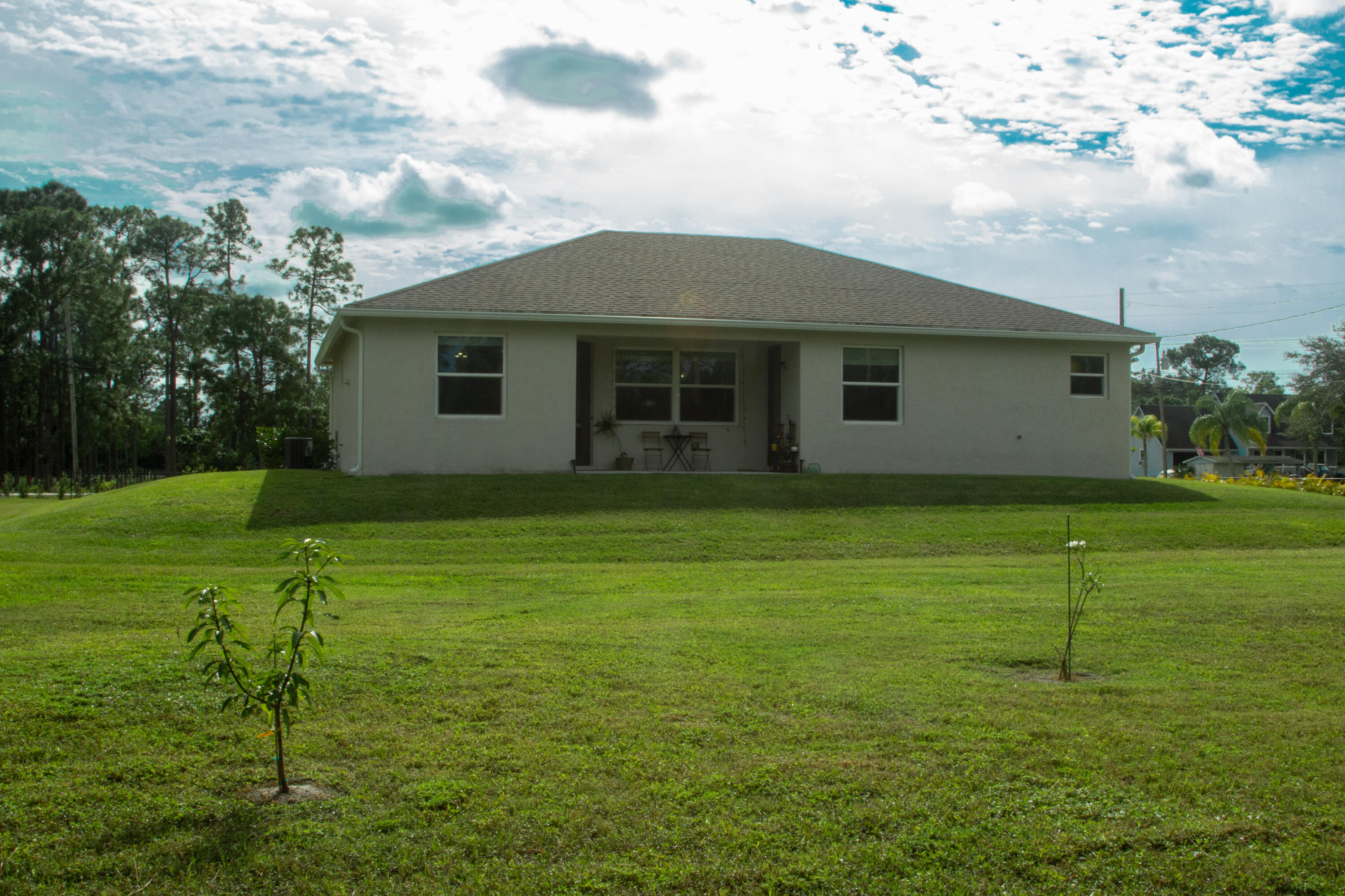 12601 57th Road North West Palm Beach, FL 33411 - Photo 23 of 24 a house with a garden