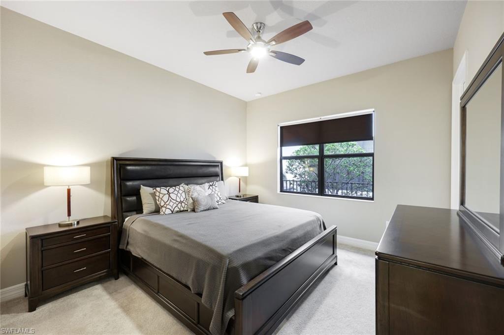4394 Caldera Circle Naples, FL 34119 - Photo 21 of 39 a bedroom with a bed and a window